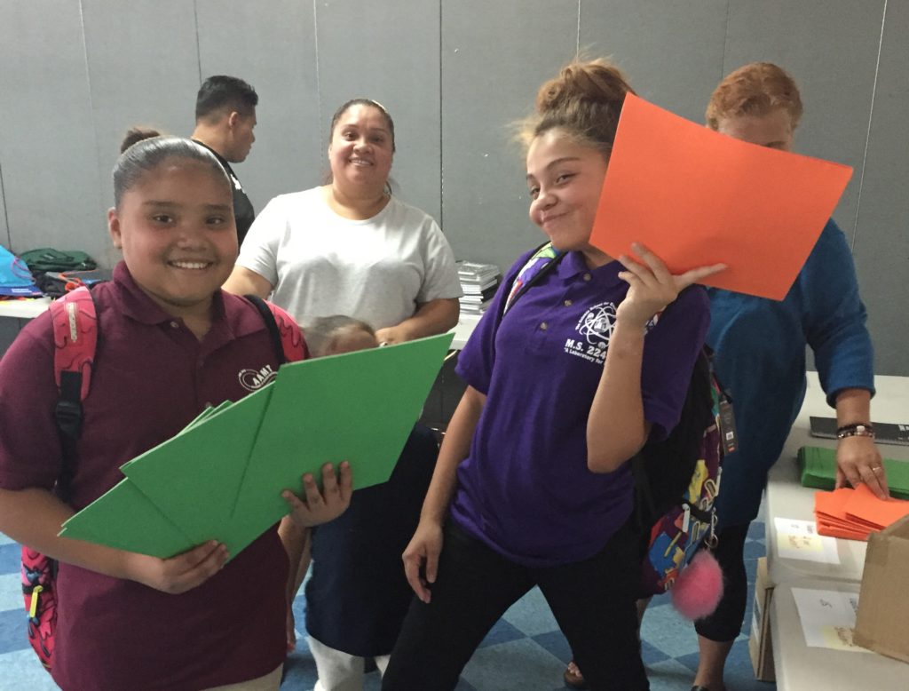 Students shopping for school supplies at our annual school supply sale